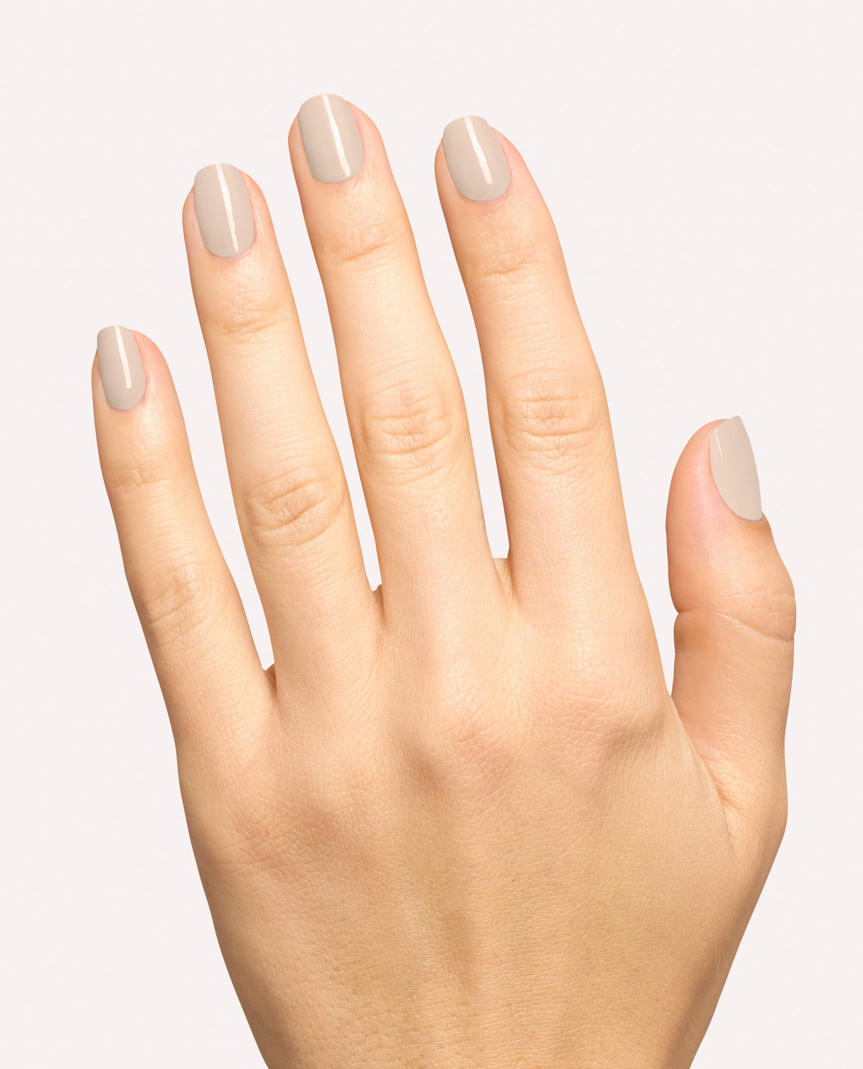 Hand modeling OPI Berlin There, Doin' That gel nail polish, a glossy taupe-beige shade