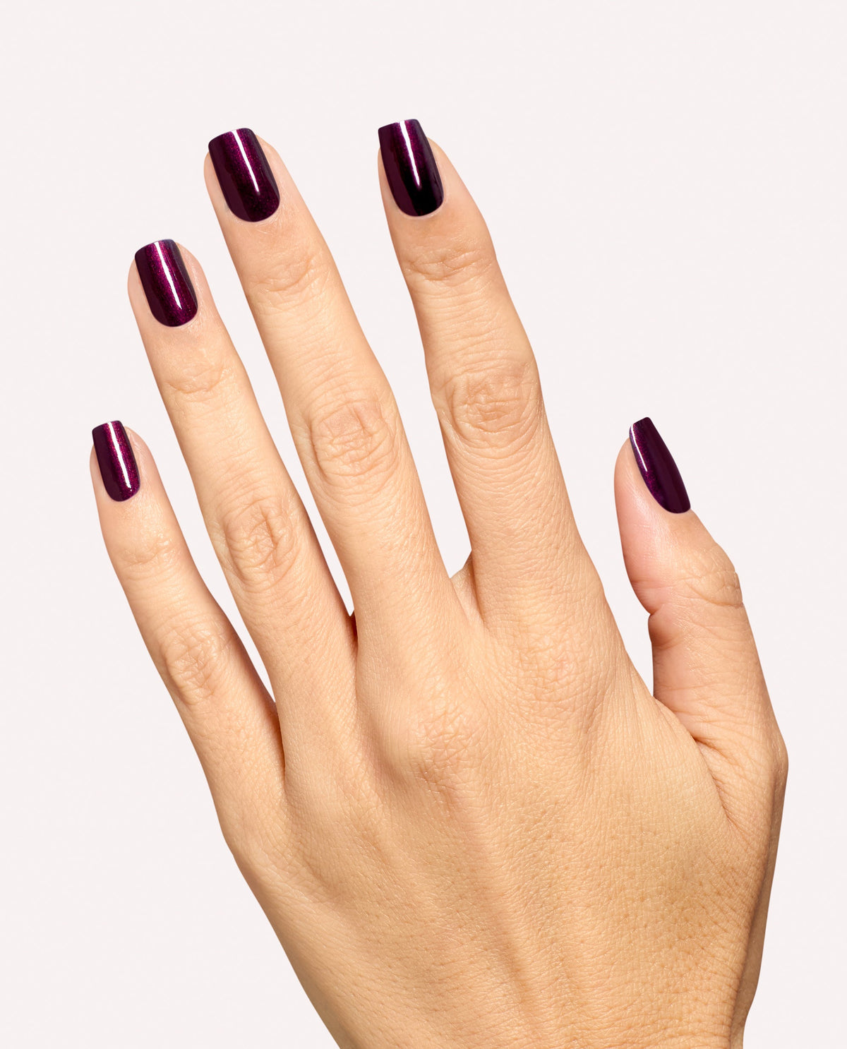 Hand with Every Month is Oktoberfest gel manicure