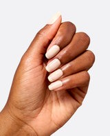 Hand displays glossy nails painted with OPI Throw Me a Wink gel nail polish